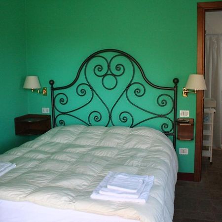 Které jsou ty nejlepší hotely v okolí atrakce Cascate del Mulino? Saturnia Pokoj fotografie
