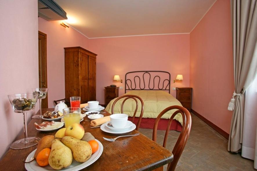 Které jsou ty nejlepší hotely v okolí atrakce Cascate del Mulino? Saturnia Pokoj fotografie