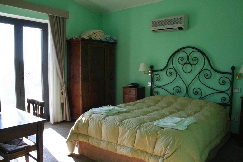 Které jsou ty nejlepší hotely v okolí atrakce Cascate del Mulino? Saturnia Pokoj fotografie