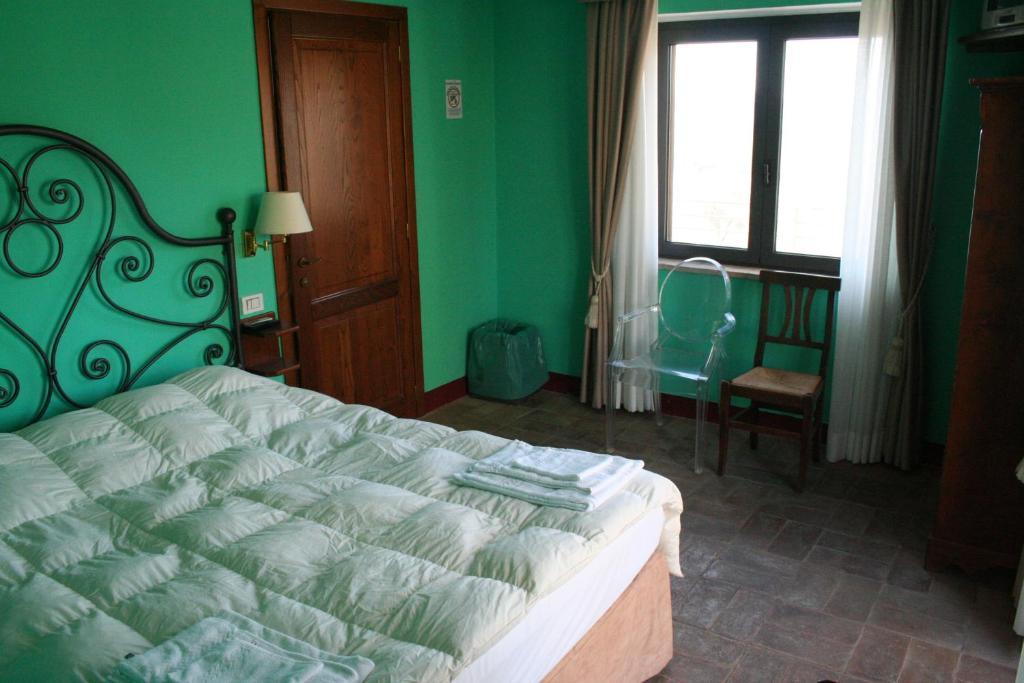Které jsou ty nejlepší hotely v okolí atrakce Cascate del Mulino? Saturnia Pokoj fotografie